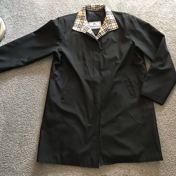 Vintage Woman’s Burberry’s black raincoat size 14